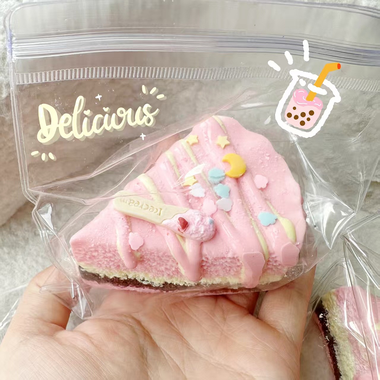 Roze Cake Squishy Knijpspeeltj - Baby Food Toy recensie en prijs